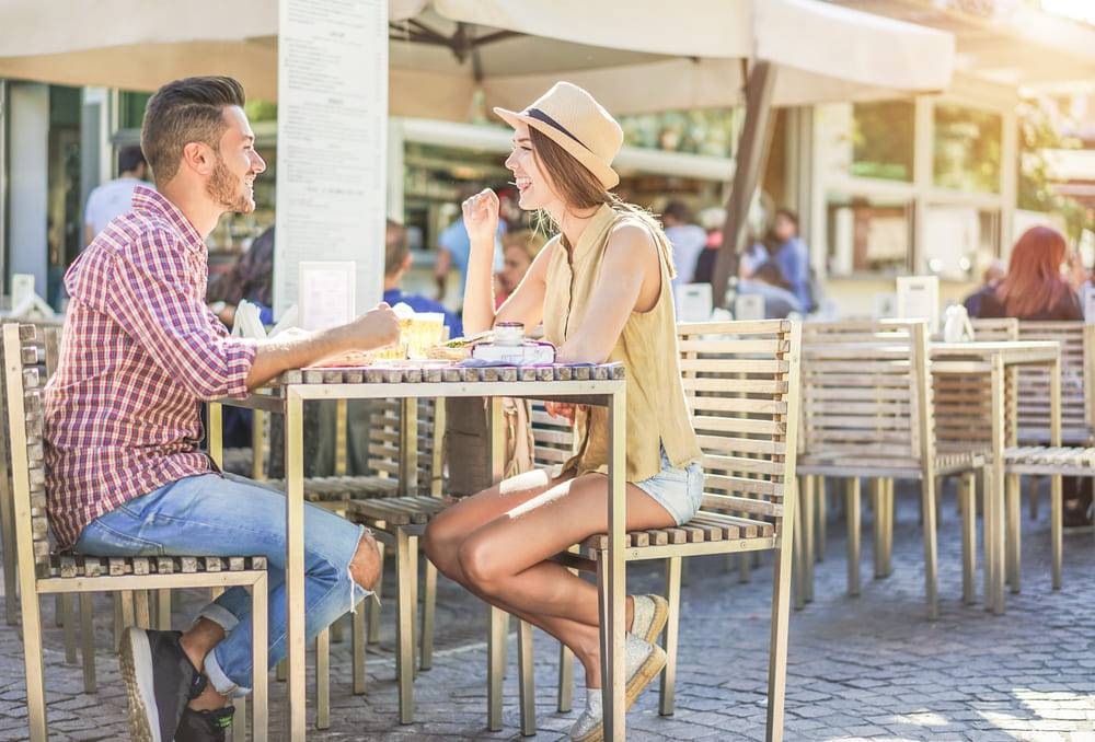 couple dining at outdoor table